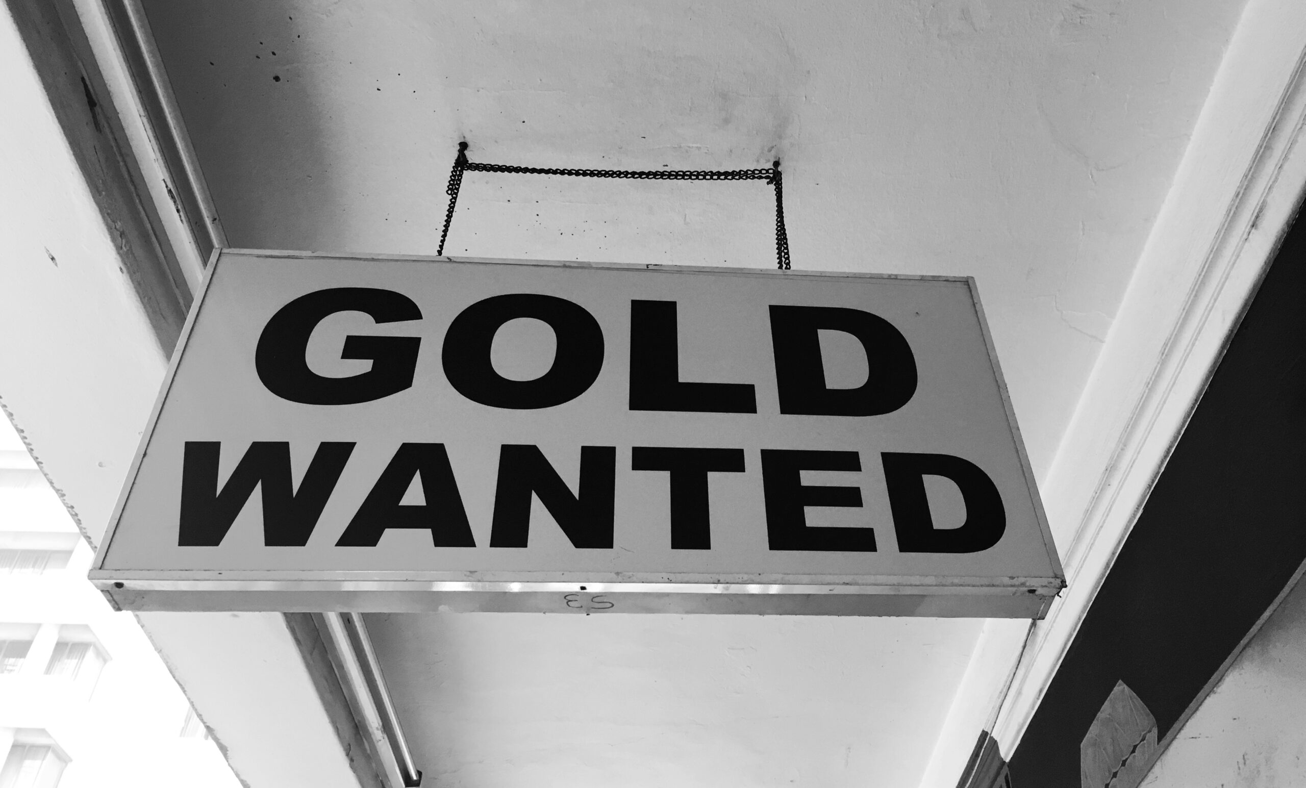 Gold Wanted sign